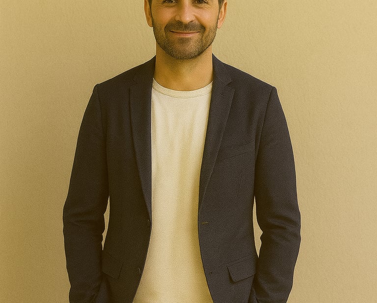 a man in a suit and white shirt