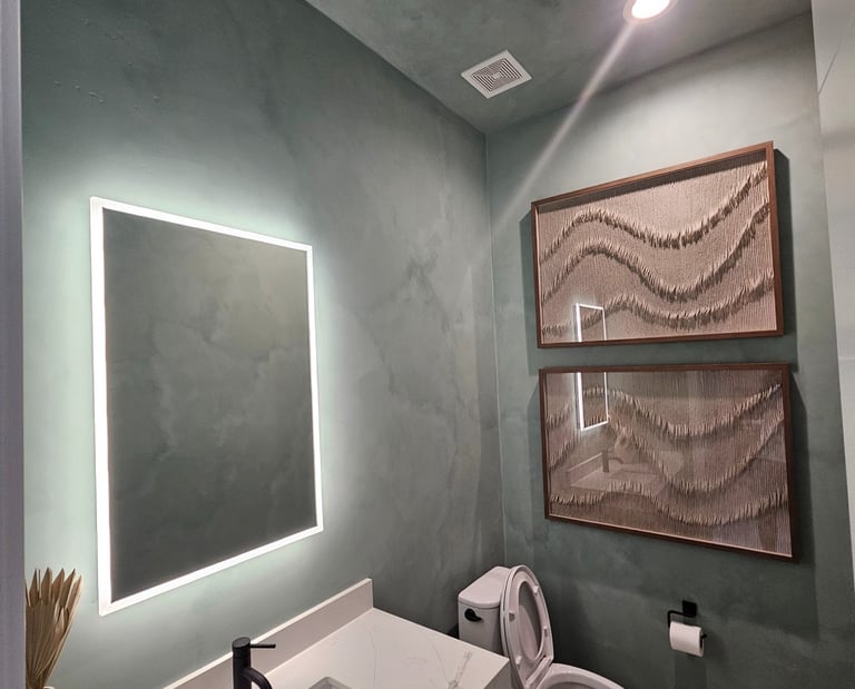 Modern bathroom with a textured limewash finish, creating a sleek and elegant in an Arizona home