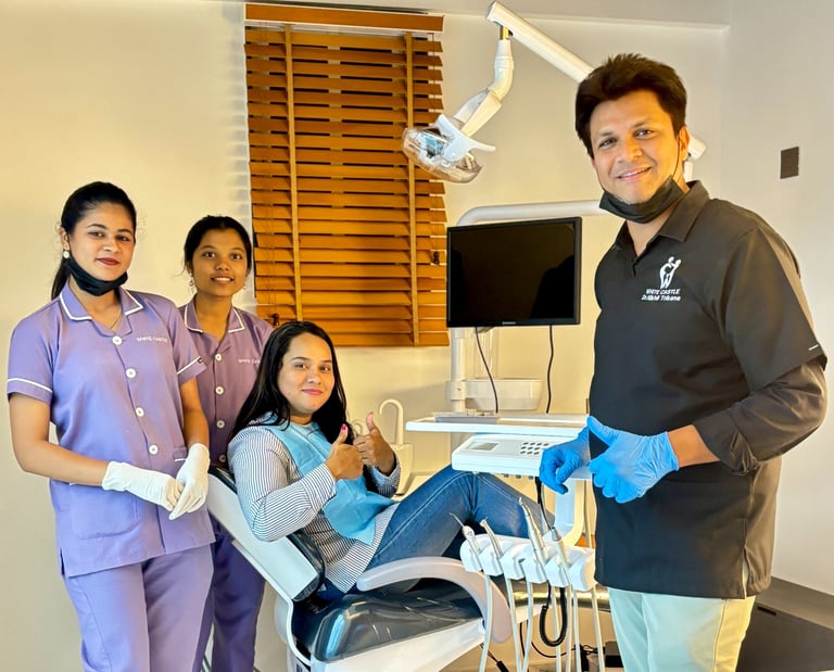 Dr nikhil trikane performing root canal and implant treatment  in white castle dental clinic katraj 