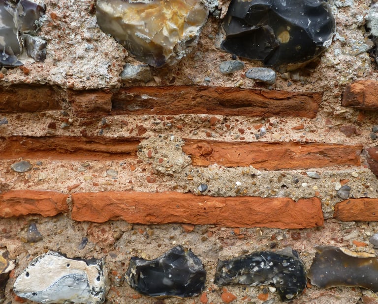 Roman wall tiles used as a string course at Burgh Castle, Norfolk