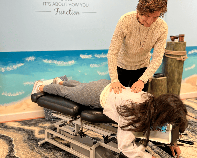 Pregnant woman receiving prenatal chiropractic care in Franklin TN