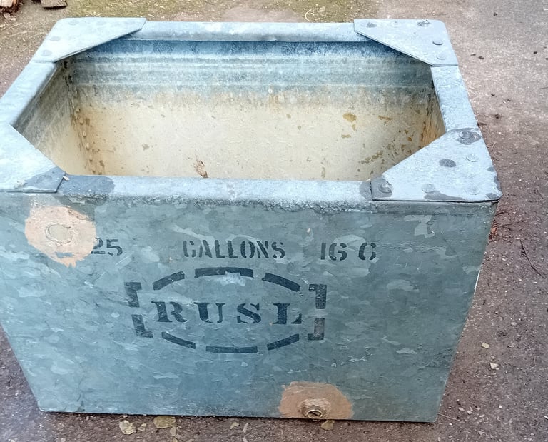Old rectangular galvanised steel cold water tank