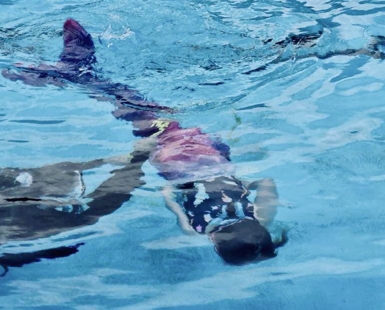 Mermaid learning to swim