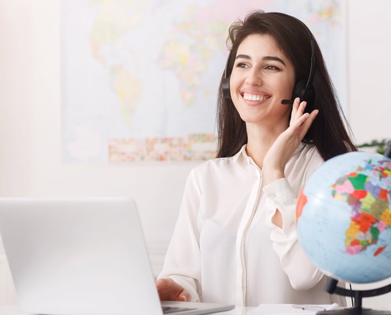 a woman in a white shirt and a globe providing customer services