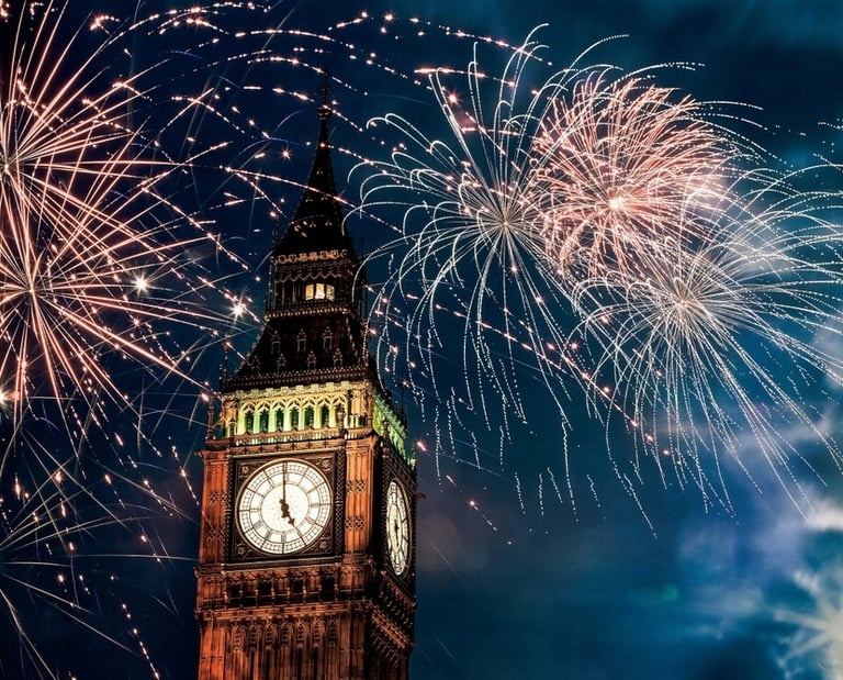 a clock tower with fireworks in the sky london