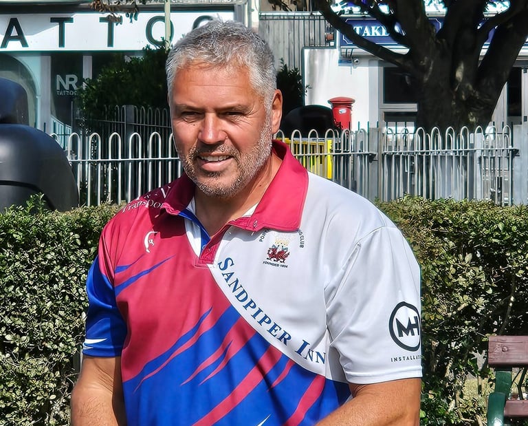 Porthcawl lawn bowls player in club shirt