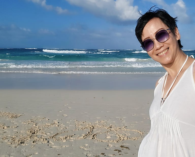 Denise Wong near ocean
