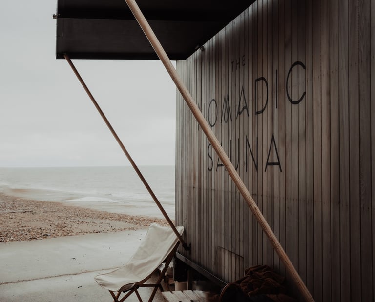 photo of wood fired nomadic sauna on the coast
