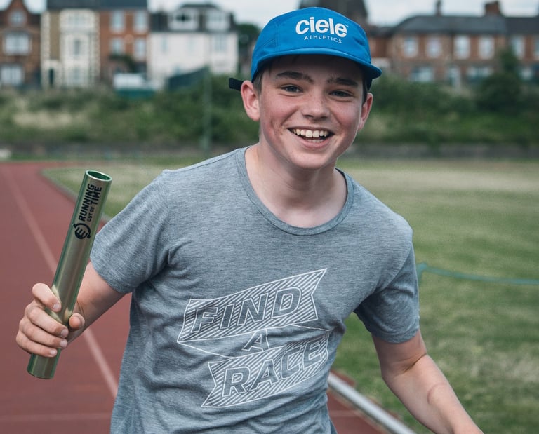 photo of a young runner at the athletics track