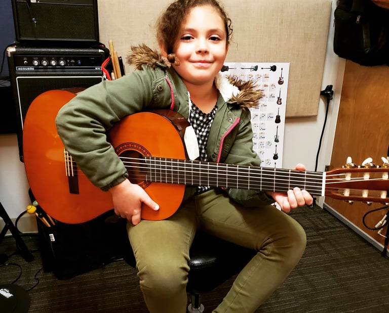 Happy guitar student