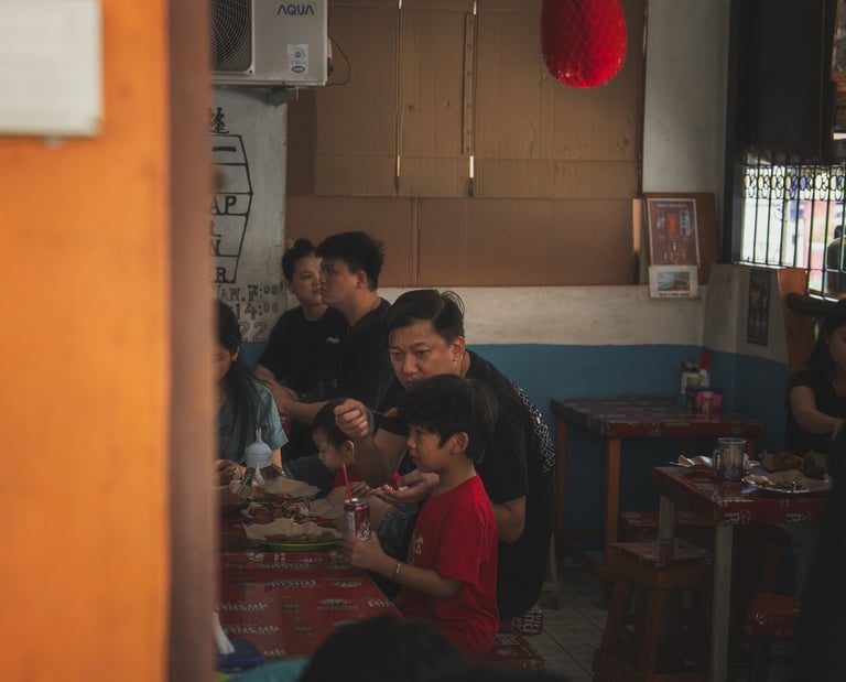 locals having breakfast at Nasi Kari Apek Loso Batam