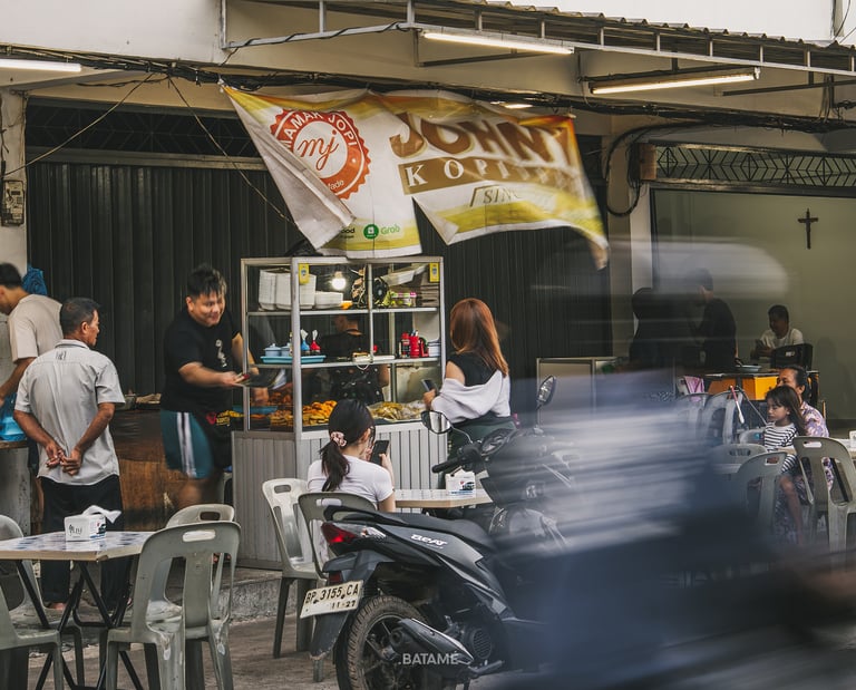 outdoor area and motorcycle crossing at Johny Kopitiam Batam