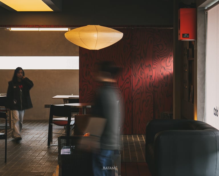 aesthetic Mid-Japandi interior with people passing at odd Batam