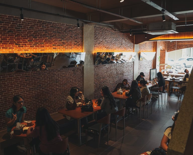 Crowds with brick interior at Joyi Bakes Batam