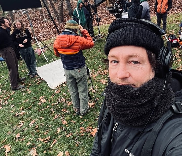 Narrative filmmaking set with sound mixer Johnny Siera and boom operator. 