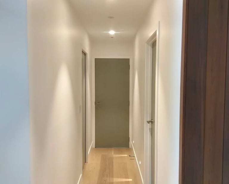 Interior painting project hallway doors - Precision Paint