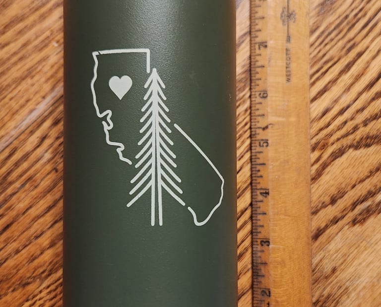 A green Klean Kanteen water bottle with a line drawing of California on it