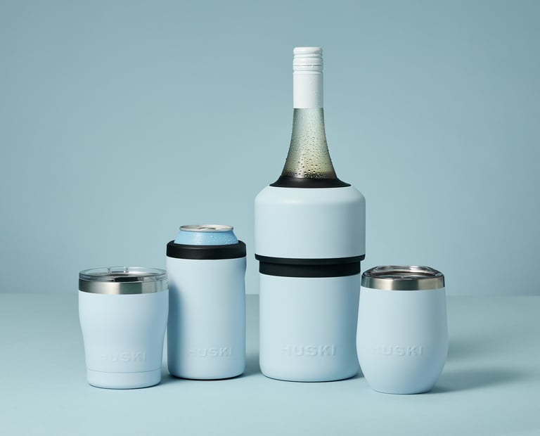 Product photography - A bottle of wine and a can inside two Huski coolers
