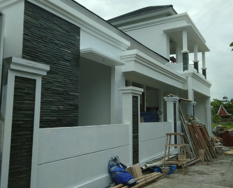 style minimalis di kombinasi dengan aksen batu alam andesit memang bagus