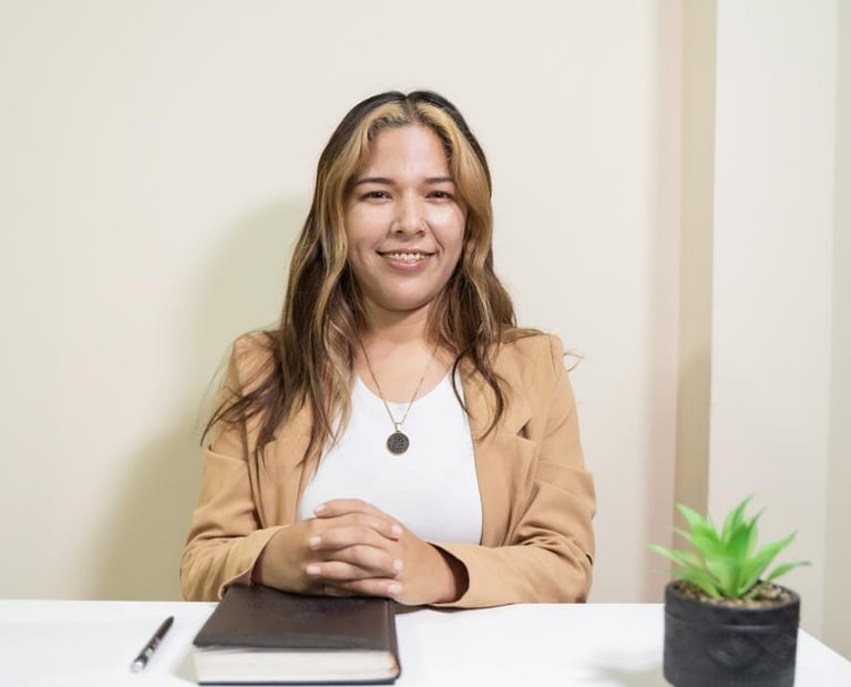 Professional psychologist smiling for a photo in formal wear