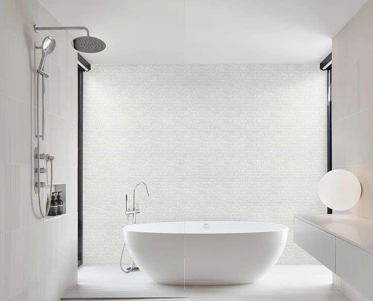 a bathtub with a large tub in the middle of a bathroom, white mosaic on the background wall