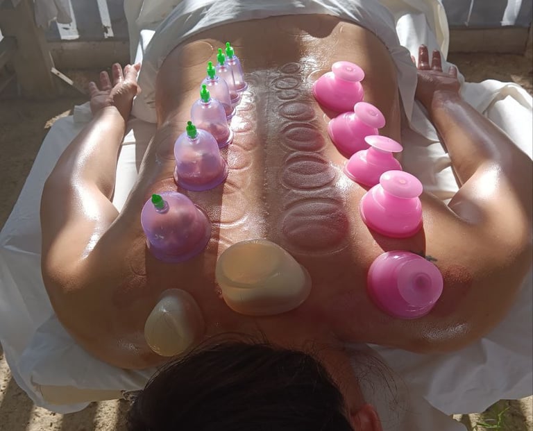 Alex Naumov applying deep pressure massage to release stored trauma and muscular tension 