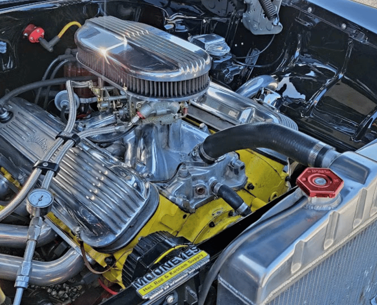 A engine compartment with complete detailing from D and P auto detailing