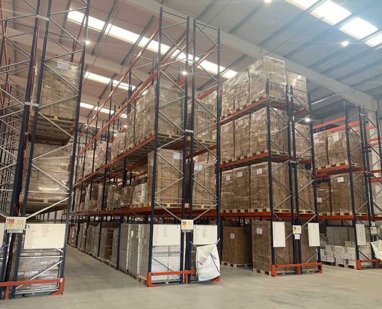 tall pallet racking in narrow aisle configuration with rack end protectors  