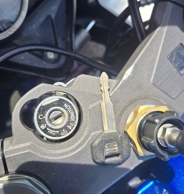 Key on an ignition representing locksmith key duplication in Asheville, NC