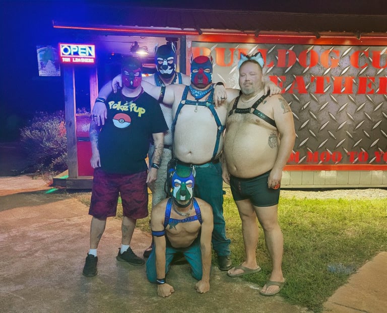 A Group of friends posing outdoors at night wearing pup masks.