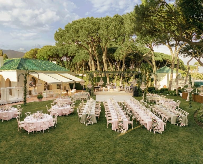 Destination wedding setup and altar in the seaside gardens of Villa El Rincon in Marbella