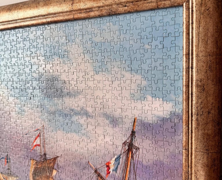 Close-up of glass-less textured artwork showing handcrafted puzzle surface detail in natural light.
