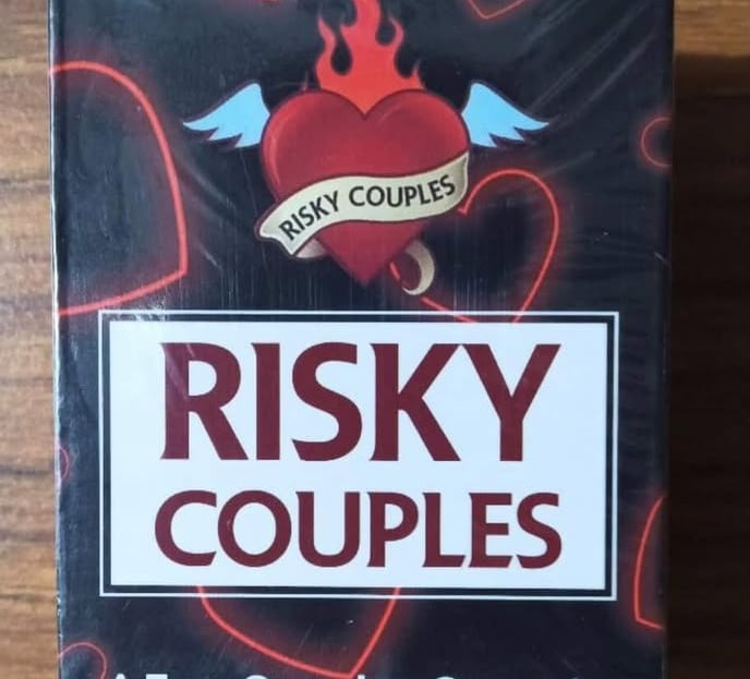 Boxed couples card game titled Risky Couples designed for playful adult game nights