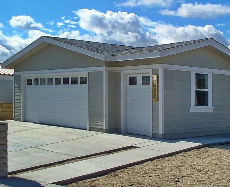 Two car plus golf cart garage addition for manufactured home. Located in Palm Desert.