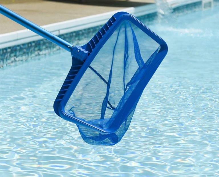 A blue heavy-duty swimming pool leaf skimmer net cleaning debris from clear pool water.