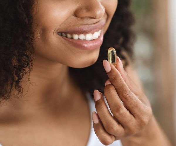 woman taking supplements