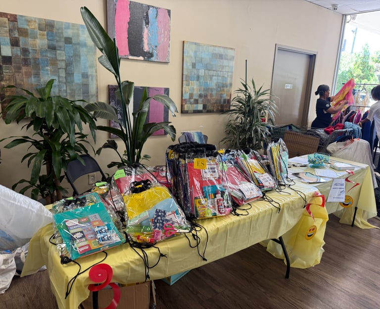 TABLE WITH BOOKBAGS