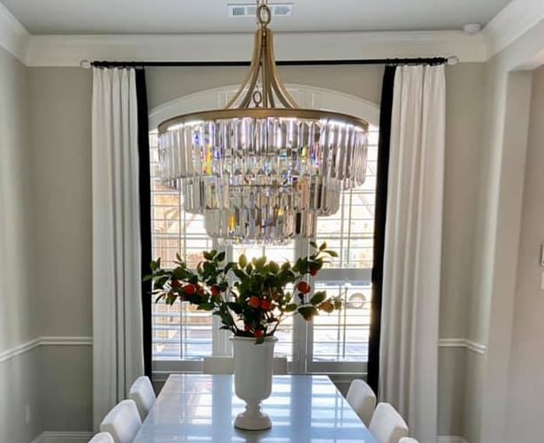Custom French Pleated Drapery with Blalck accent band on leading edge.  Custom Black Hardware with acrylic finials Kasmir Fab