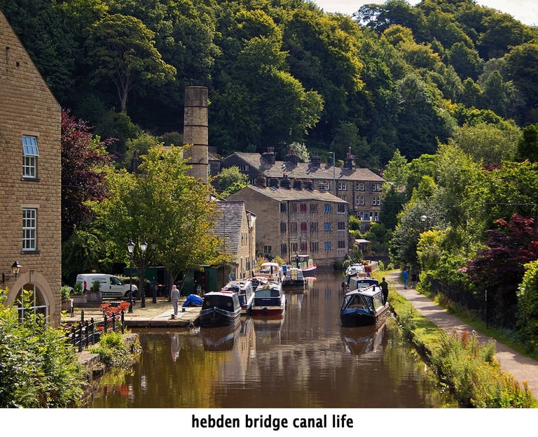 barges and people at hebden bridge on the rochdale canal