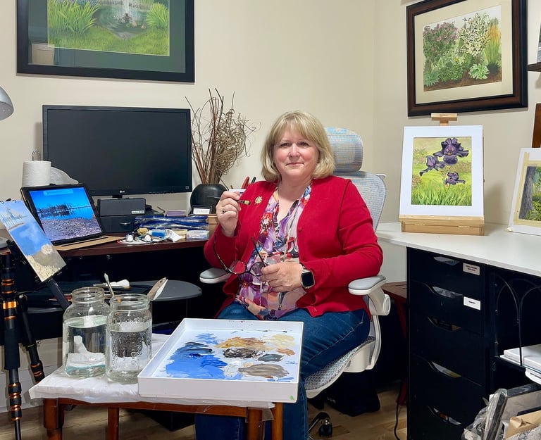 Sylvia McConnell painting in her office