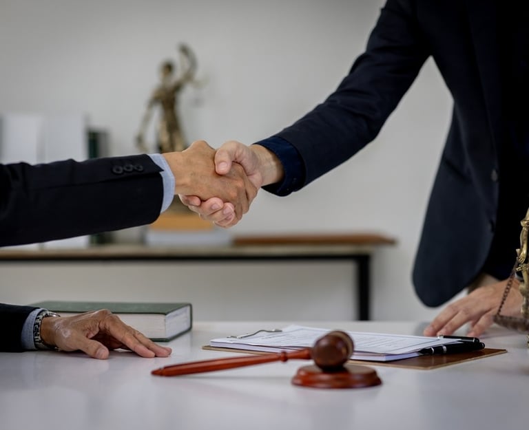 judge shaking hands with lawyer