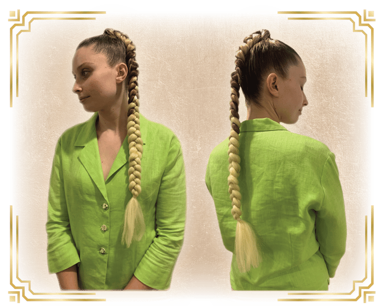 a woman with a green jacket and long braid plait