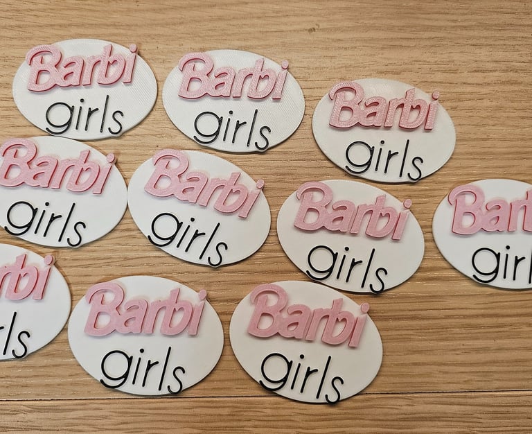 a number of baby shower signs on a table