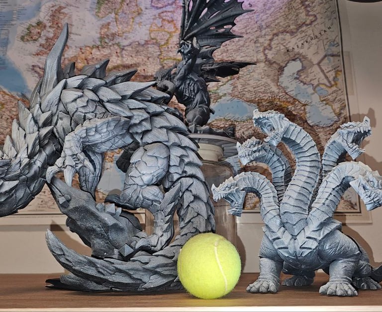 a tennis ball and a dragon on a table