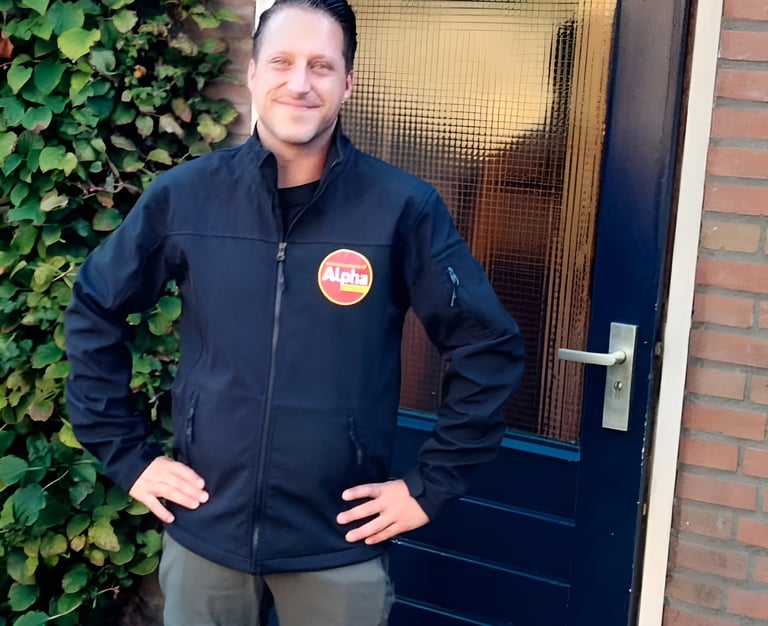 a man standing in front of a door with a sign that says,'happy