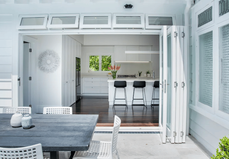 Kitchen folding door by Qualitas Builders in Auckland
