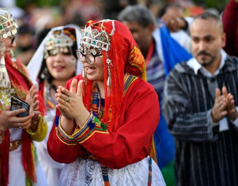 a group of people in traditional costumes and costumes
