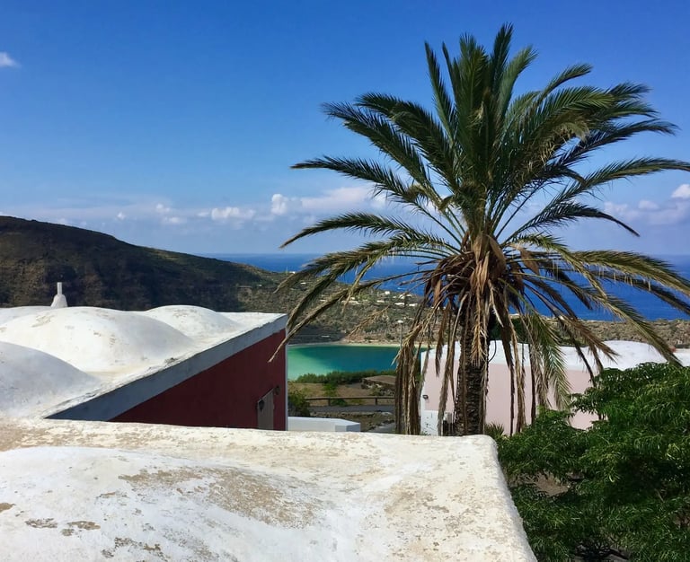 Traditional house in Bugeber with lake view, green hills and clear sky