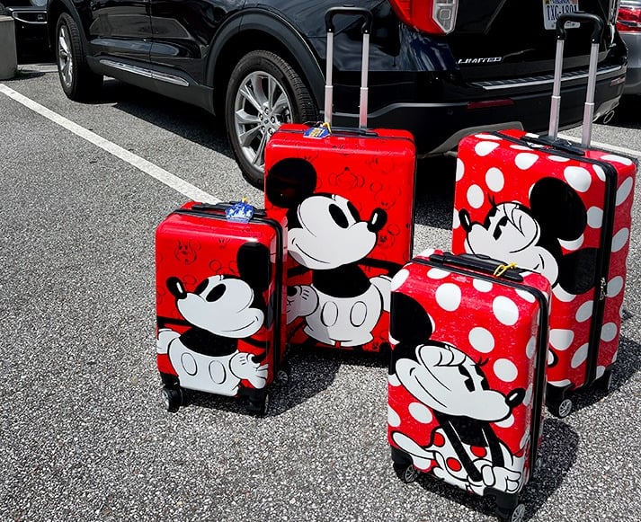 Mickey Mouse and Minnie Mouse luggage set.
