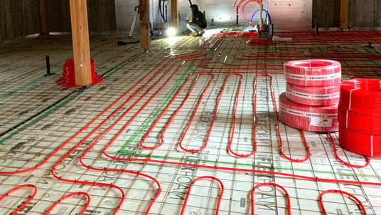 radiant in floor heating pipes uncovered
